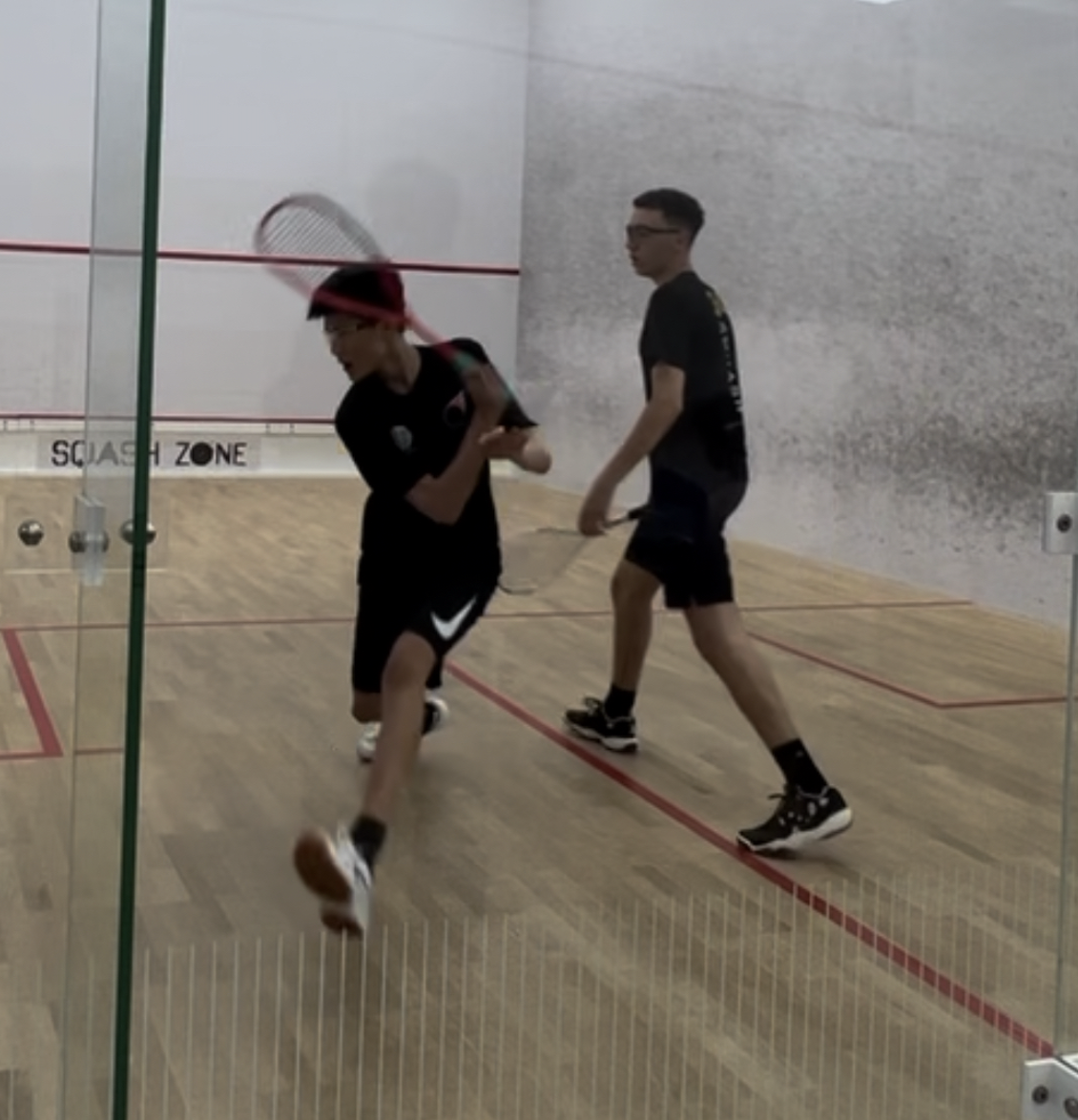 Alan playing squash